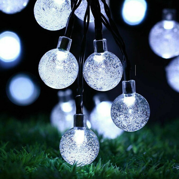 Novelty solar outlet string lights